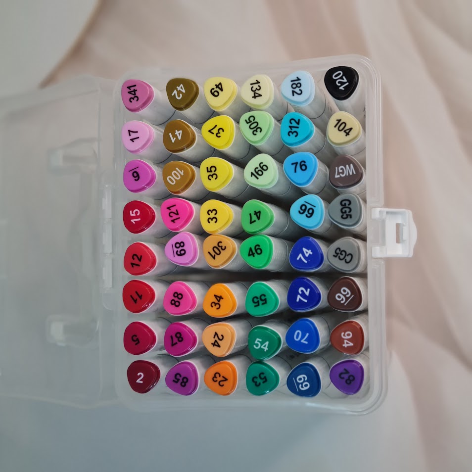 Usmile Toys art supplies: a 48-color marker pen set with bright and anime-inspired colors, featuring a peacock design on the packaging insert."